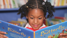 Child reading a book